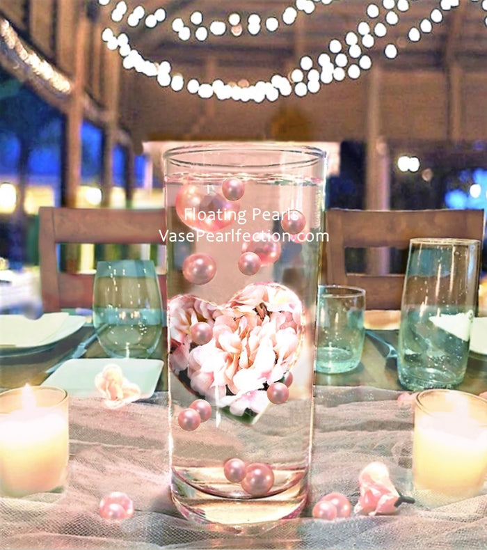 Gran corazón "flotante" lleno de hortensias rosa claro y perlas - Decoración de jarrones